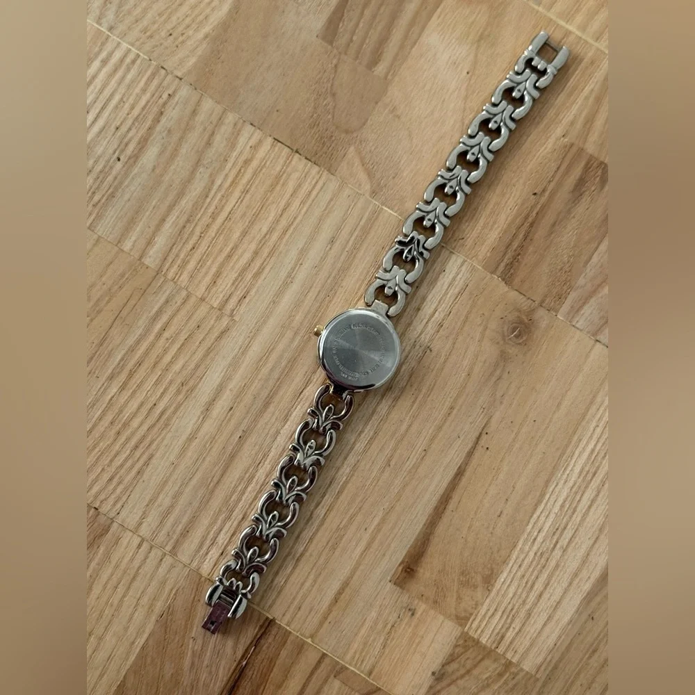 Bulova Diamond Vintage Ladies Watch Two-Tone Bracelet Case Shimmery Silver Dial